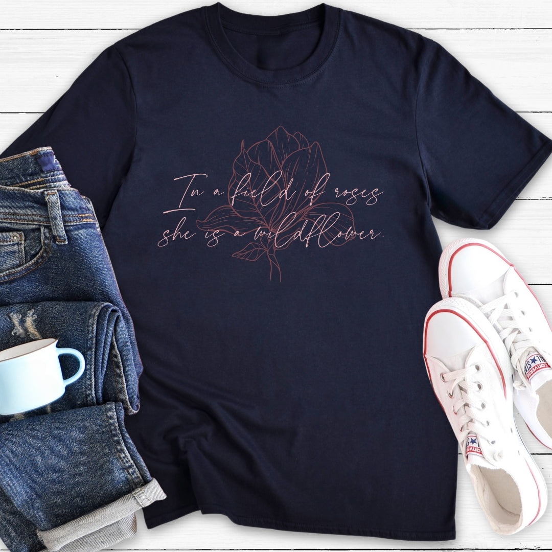 In a field of roses she is a wildflower | T-Shirt